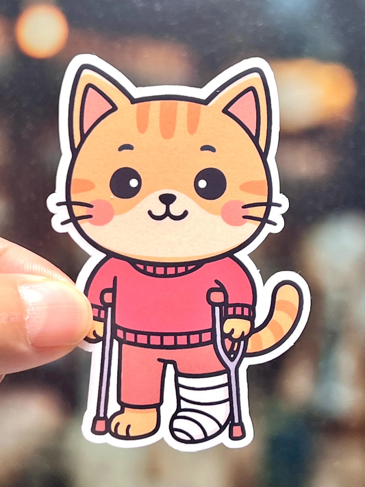 Cartoon cat sticker with a bandaged paw and crutch.