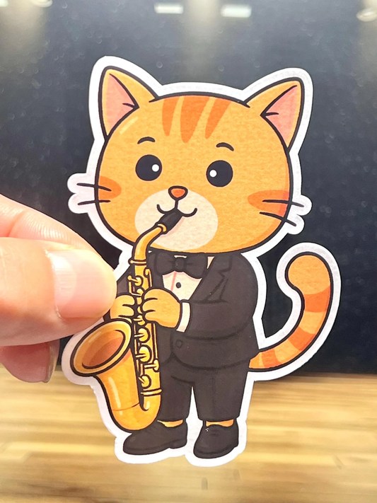 Kawaii design cartoon cat playing a saxophone vinyl sticker 