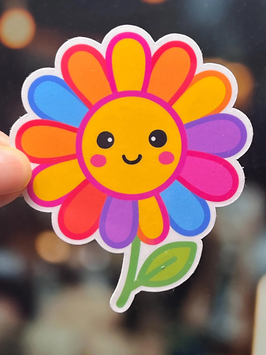 Colorful flower-shaped sticker with a smiling face