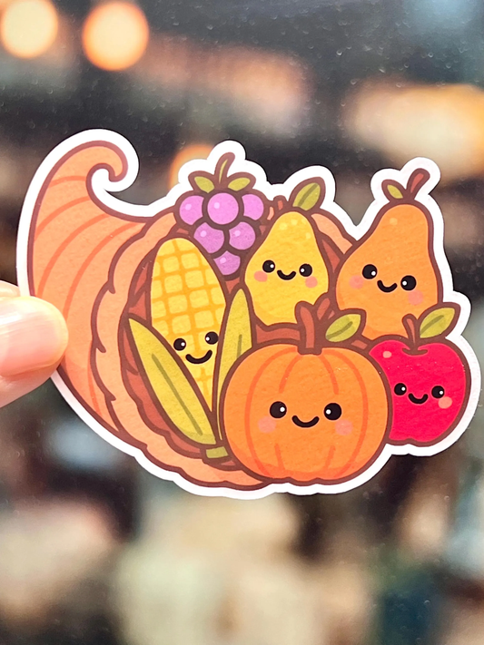 A stocker of a Thanksgiving cornucopia filled with corn, pumpkin, and fruits
