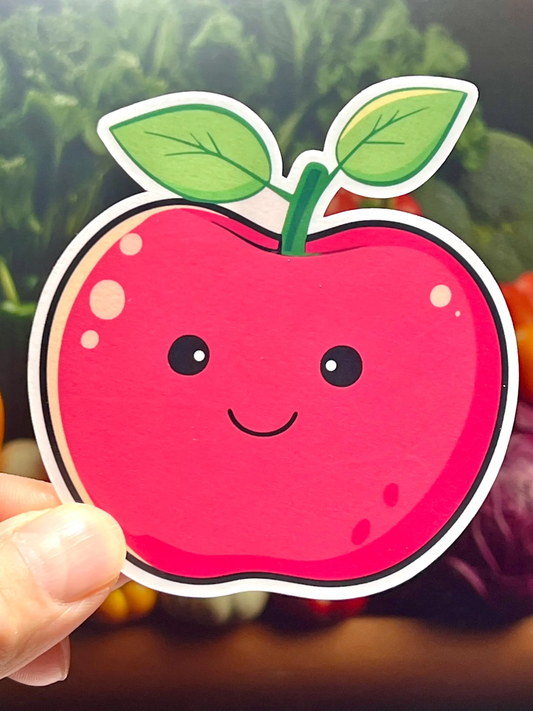 A smiling apple with eyes and a red blush, designed as a sticker.