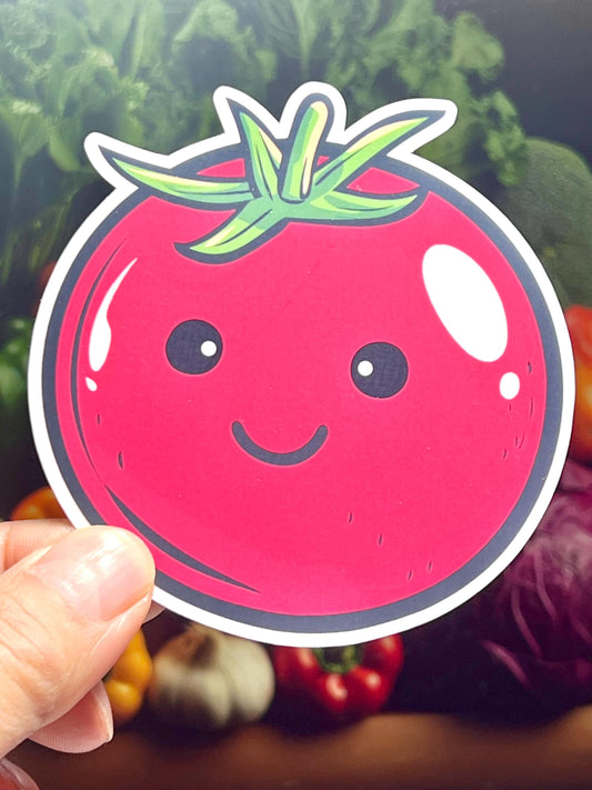 Sticker depicting a smiling tomato with a green stem and leaves.