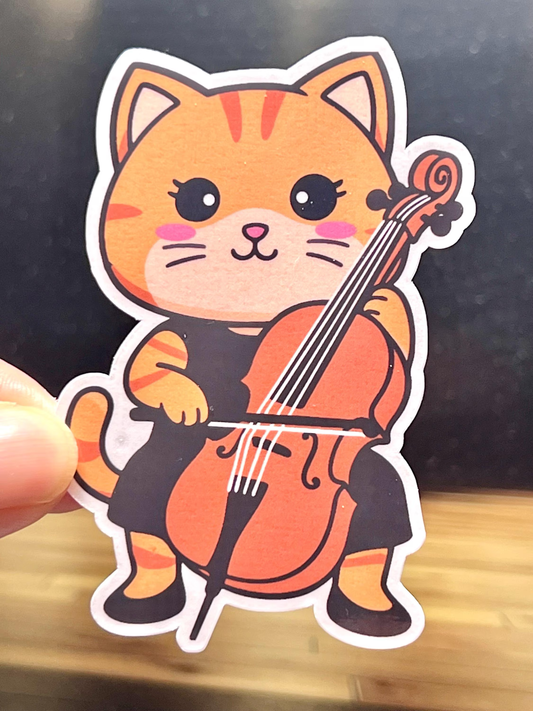 Sticker of a girl cat in black orchestra dress playing a cello.
