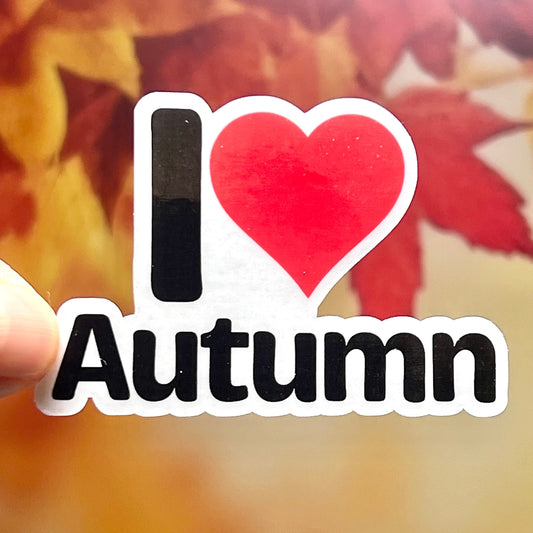 Sticker that says I love Autumn with a red heart instead of the word love.
