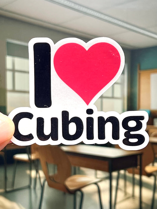 A vinyl sticker with the text 'I love CUBING' and a heart symbol. For those who like solving Rubik's Cubes