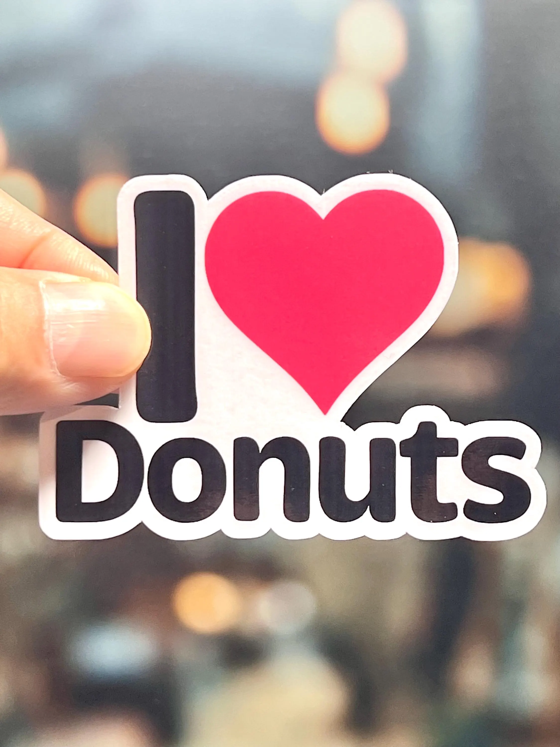 I Love Donuts written as  I Heart Donuts with a red heart.
