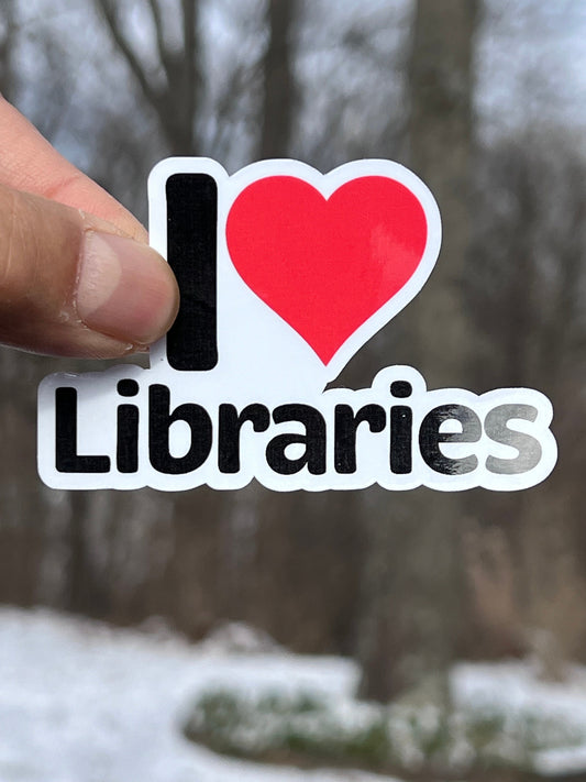 A sticker that says I Love Libraries with a Heart instead of the word Love.