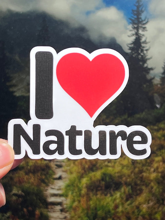 A sticker with the text 'I LOVE NATURE' and a heart symbol between the words. 