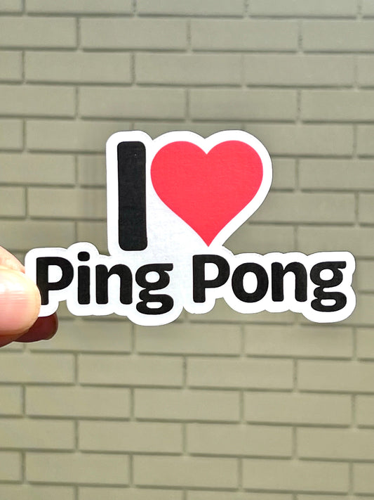A vinyl sticker with the text 'I LOVE PING PONG' and a red heart symbol replacing the word 'LOVE'.
