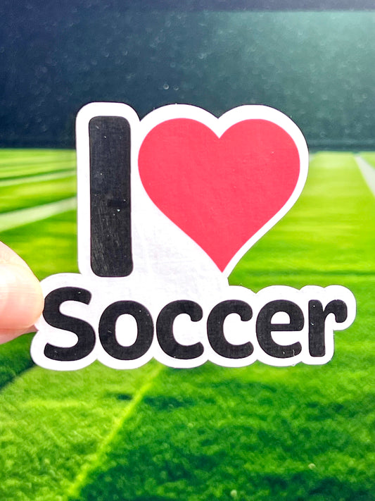 A vinyl sticker with the text 'I LOVE SOCCER' and a heart symbol.