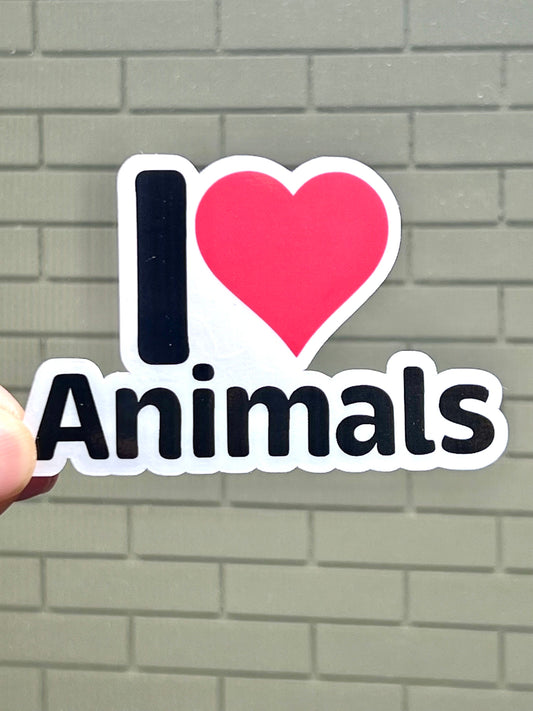 A vinyl sticker with the text 'I love animals' and a red heart symbol replacing the word 'love'.
