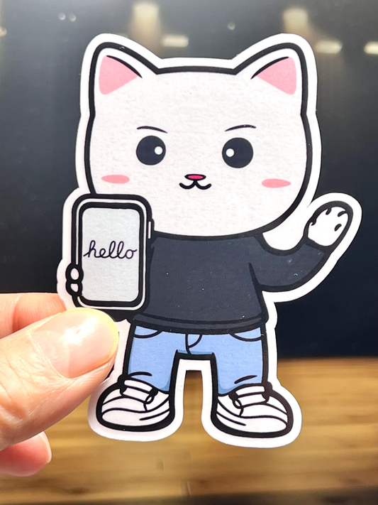 A vinyl sticker of a Steve Jobs inspired cat holding an iPhone