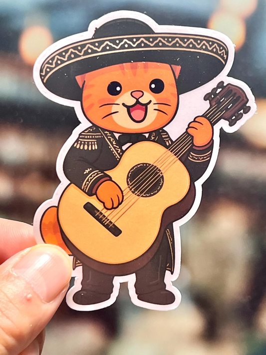 Sticker of a cat in mariachi attire holding a guitarron