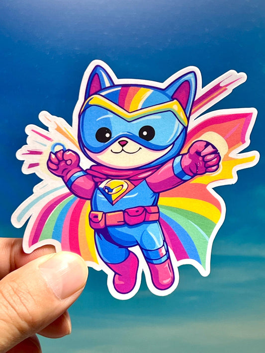 A colorful sticker of a superhero cat character with a rainbow costume flying.