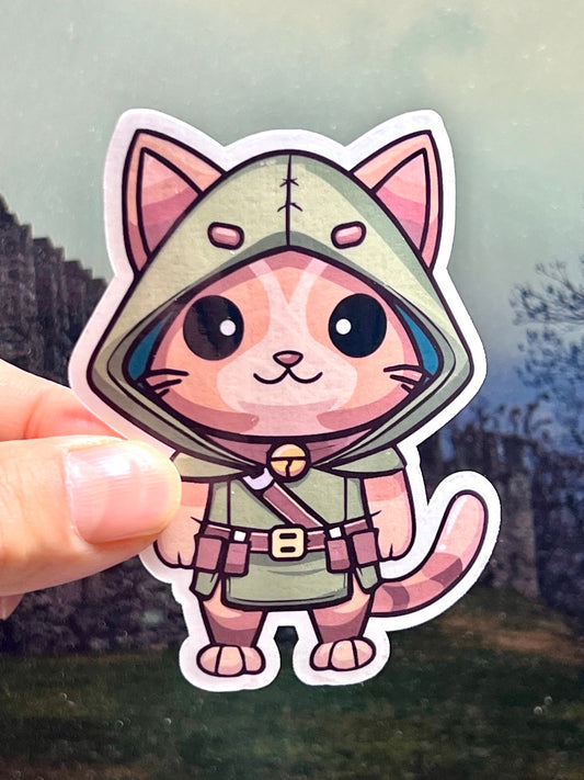 A sticker of a cat dressed like Robin Hood wearing a green hooded outfit.