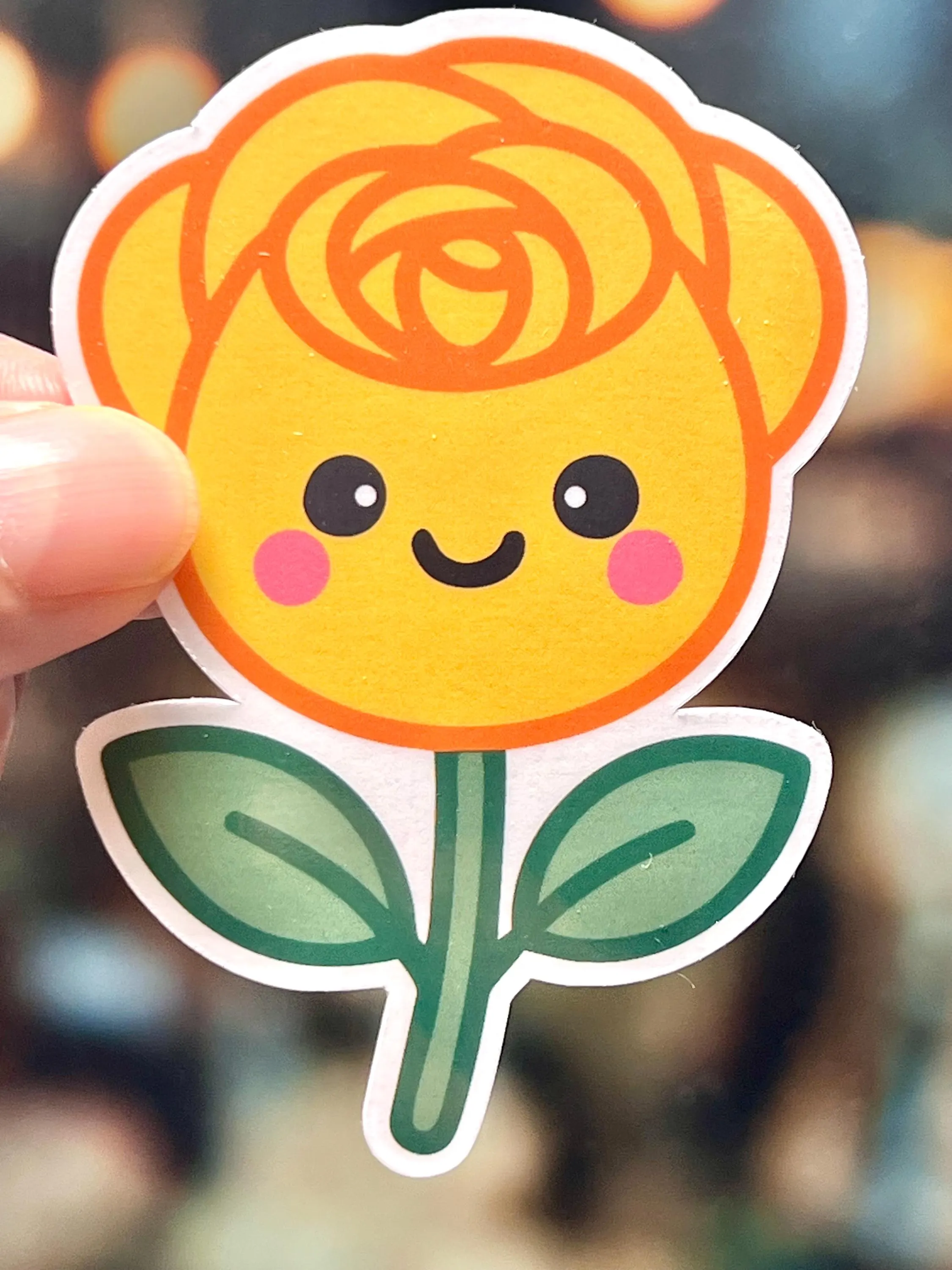 Sticker of yellow rose sticker with a happy face, kawaii design