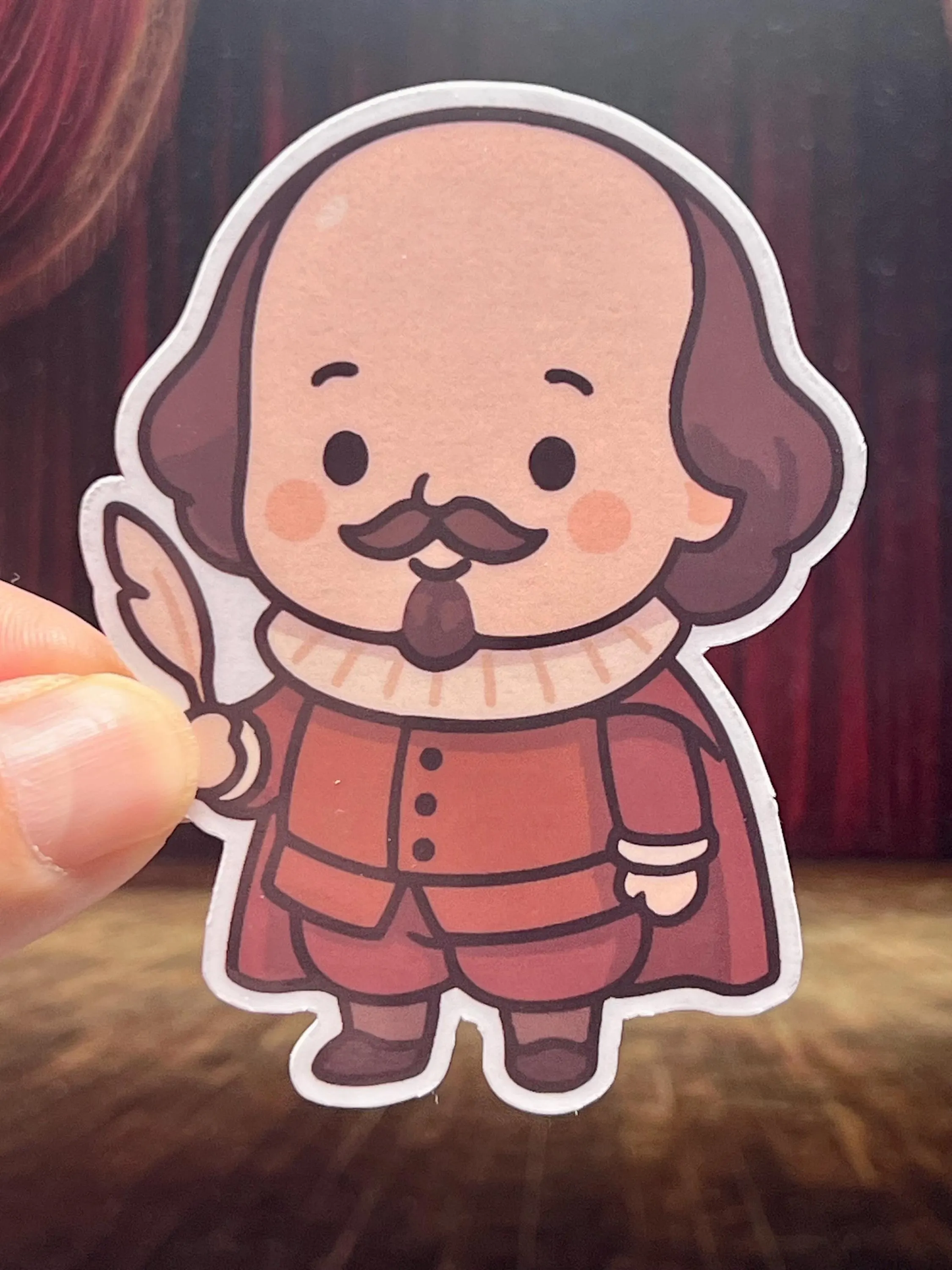Cartoon sticker of  William Shakespeare with a quill. Cute Design.