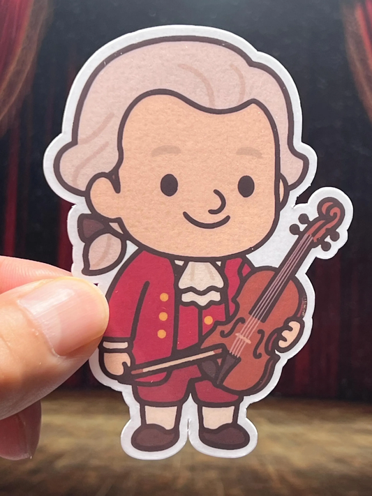 Cartoon sticker of a Wolfgang Amadeus Mozart in classical attire holding a violin.