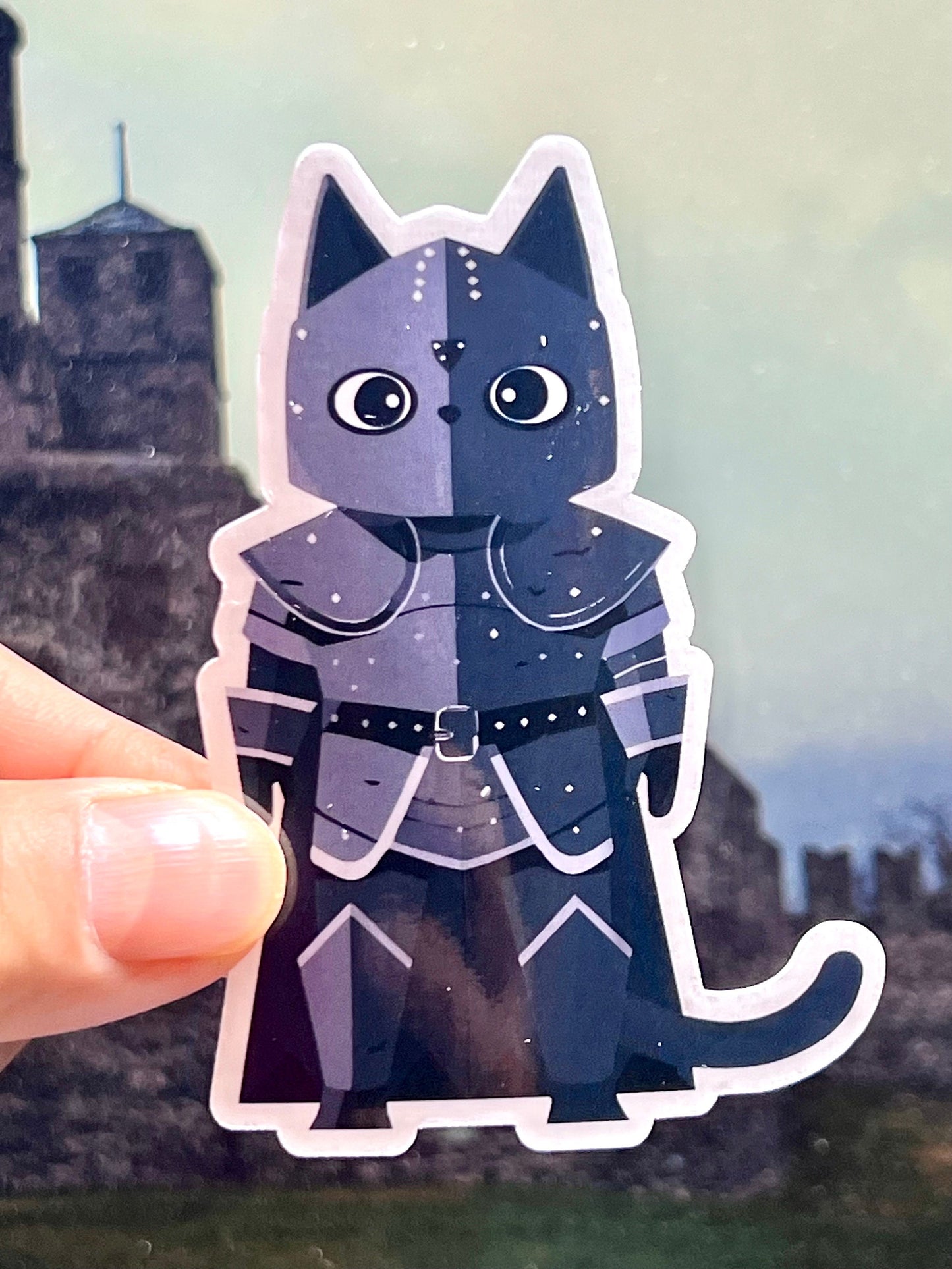 A vinyl sticker depicting a black cat in a medieval armor design
