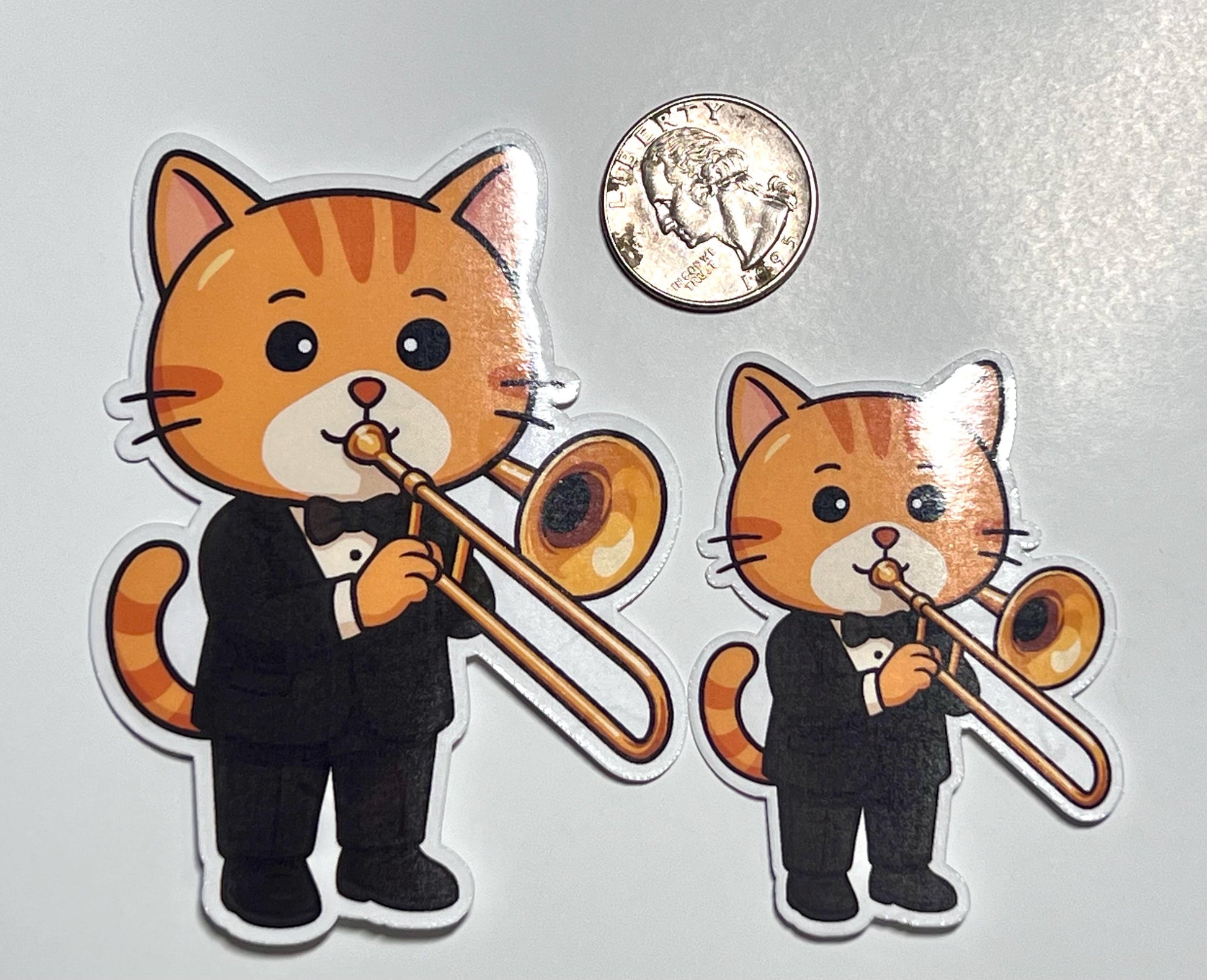 Cat playing trombone stickers- available in two sizes 2.5i inches and 3.5 inches